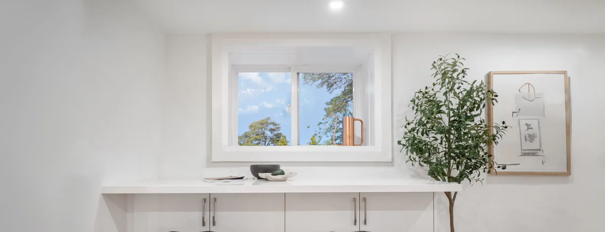 White single slider replacement window with one operating sash